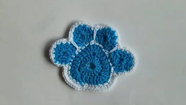 30 Paw Coaster Crochet Patterns Image